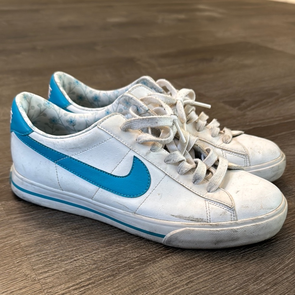 Nike White Sneakers with Blue Accents